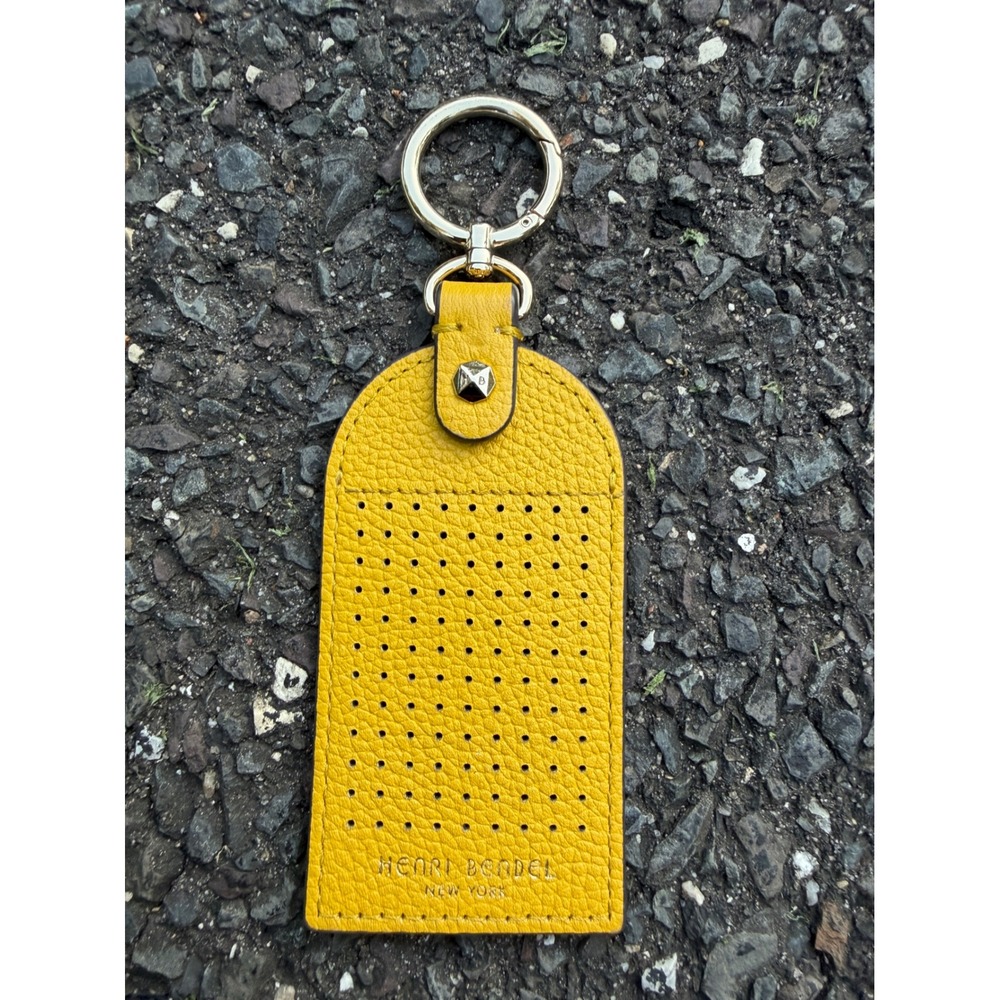 Henri Bendel Yellow Pebbled Leather Perforated Striped Keychain Bag Charm